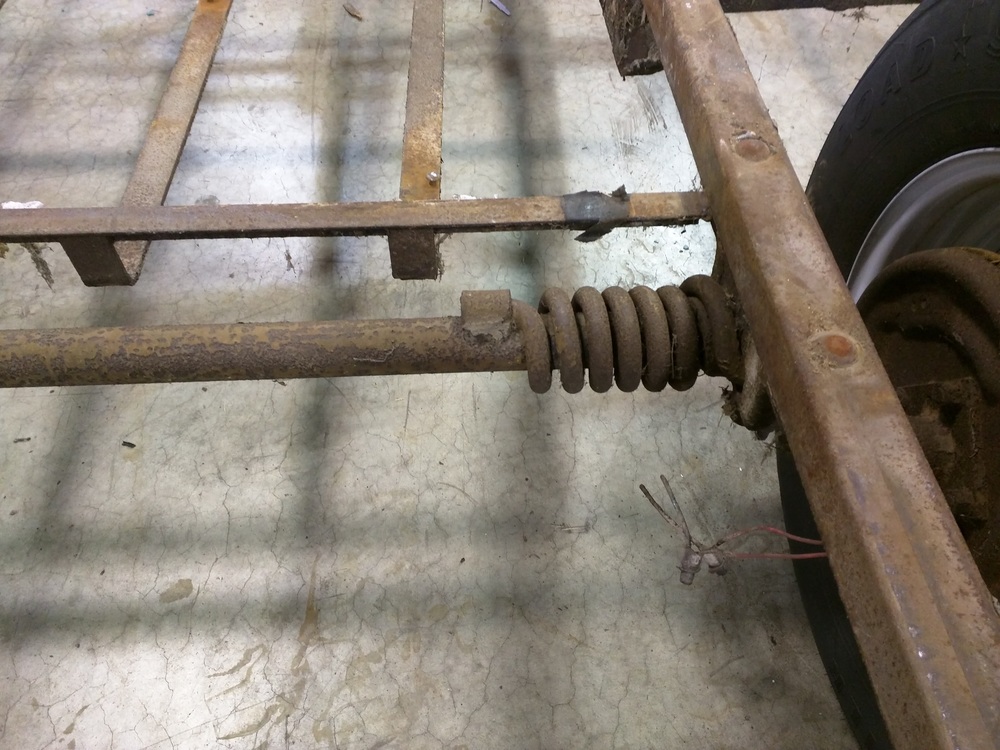 Curb side torsion spring