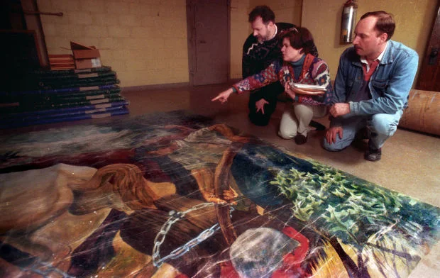 Mitchell Elementary School staff examining the Zingale mural, circa 1996