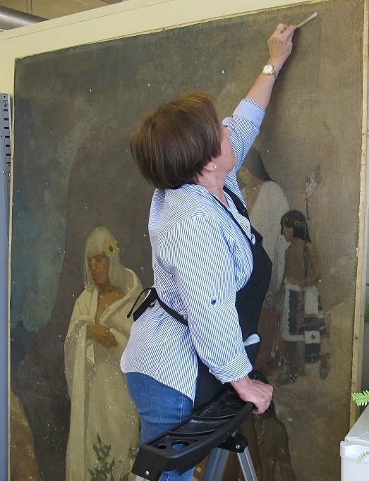 "Navaho" being cleaned by Chief Conservator of Murals Dr. Margaret Nowosielska.