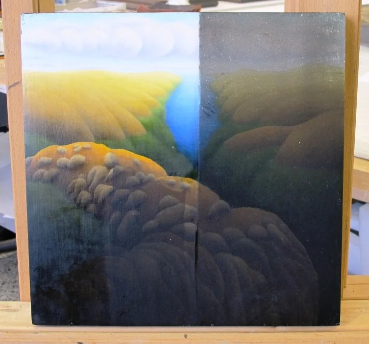 During Treatment - The colors begin to show from behind the sooty surface.
