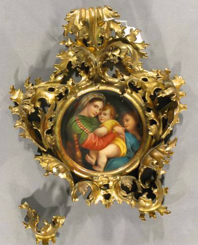 (Above) 19th century Rococo Revival carved wood and gilt frame with painted porcelain plaque as it came to The Center.