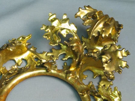 (Above) Detail of ingilding the new elements in 24K gold leaf.