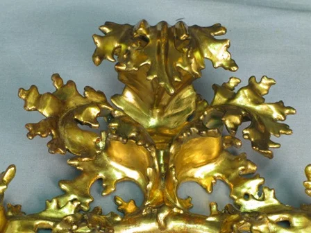  (Above) To finish the treatment, the newly gilded areas were toned to emulate the original finish