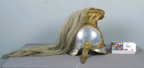 (Above) Before treatment: A Napoleonic Dragoon Helmet made of metal and horsehair