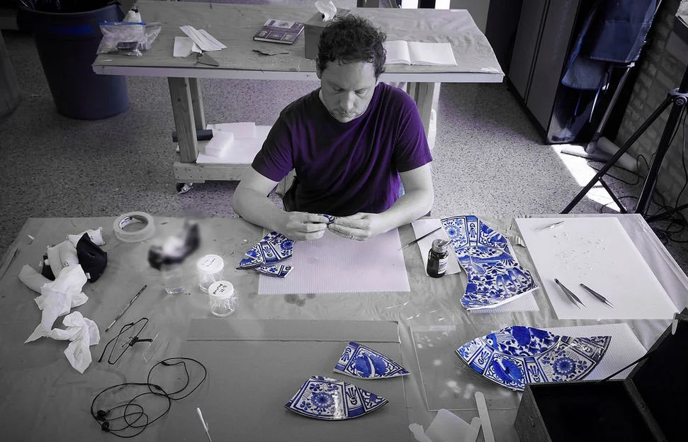 Josh working on the broken antique plate