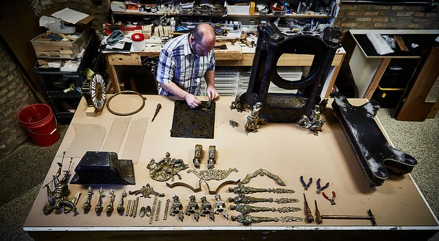 Stephen Ryan had to take all the decoration off the clock to determine exactly what was missing so he could begin to re-create those elements.