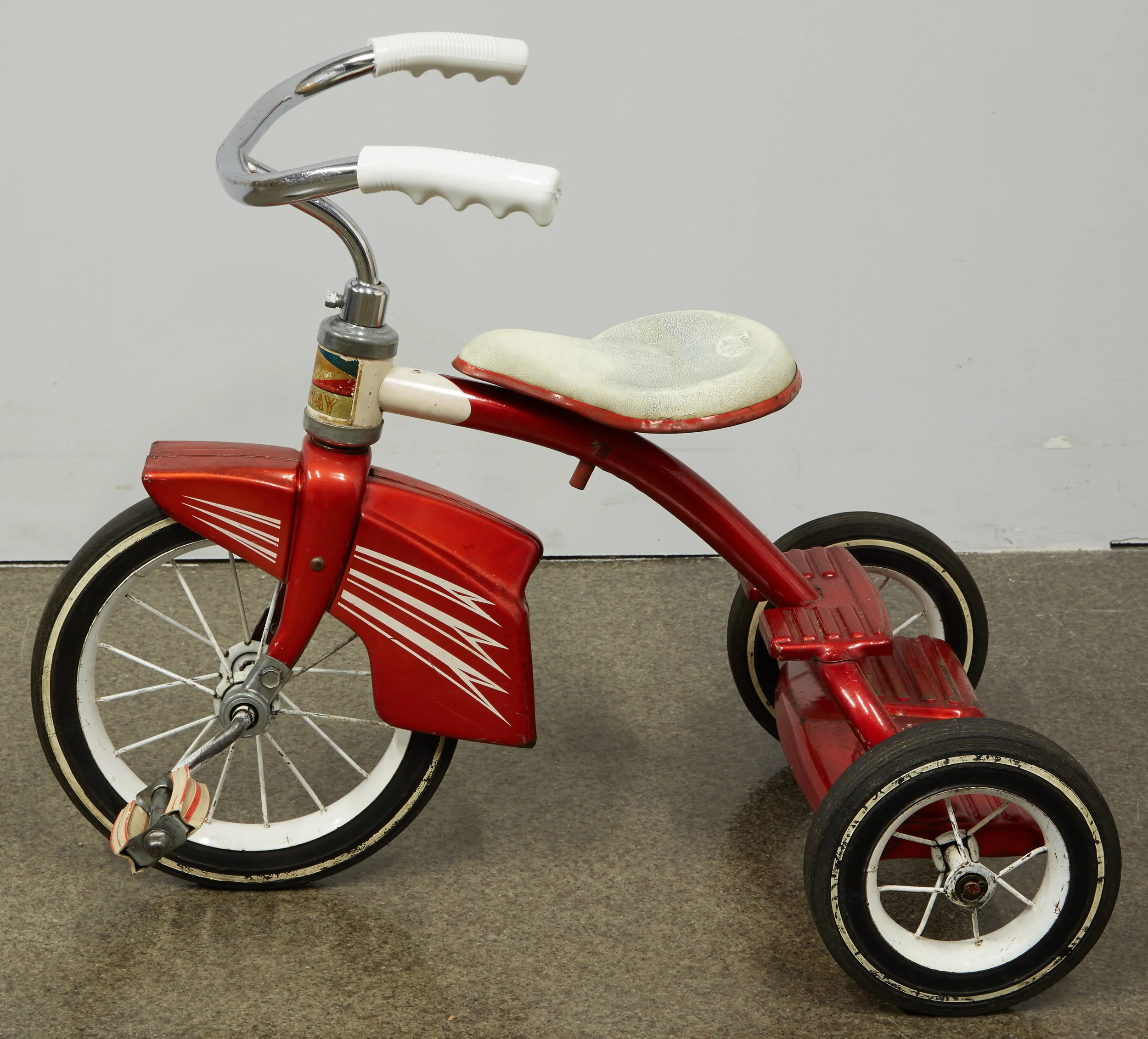 Post-treatment, the charm of Mary’s 1964 Murray tricycle shines through. 