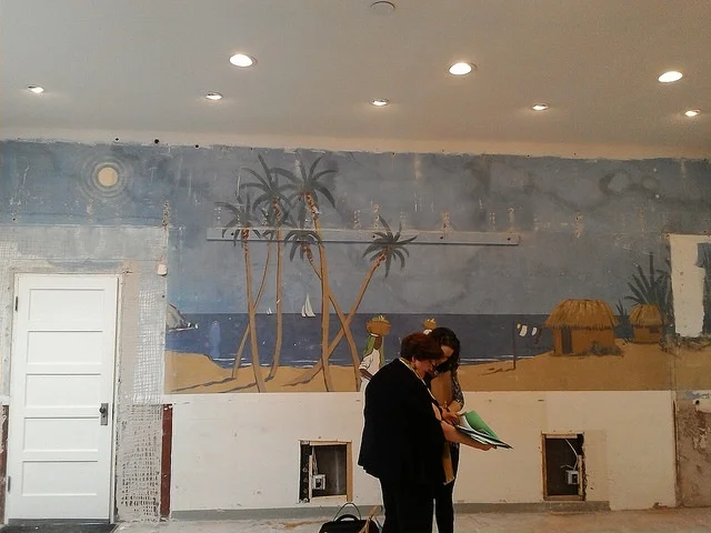 Rebecca Vodehnal, The Conservation Center's Painting Conservator with Gail Fox of the West Foundation Board