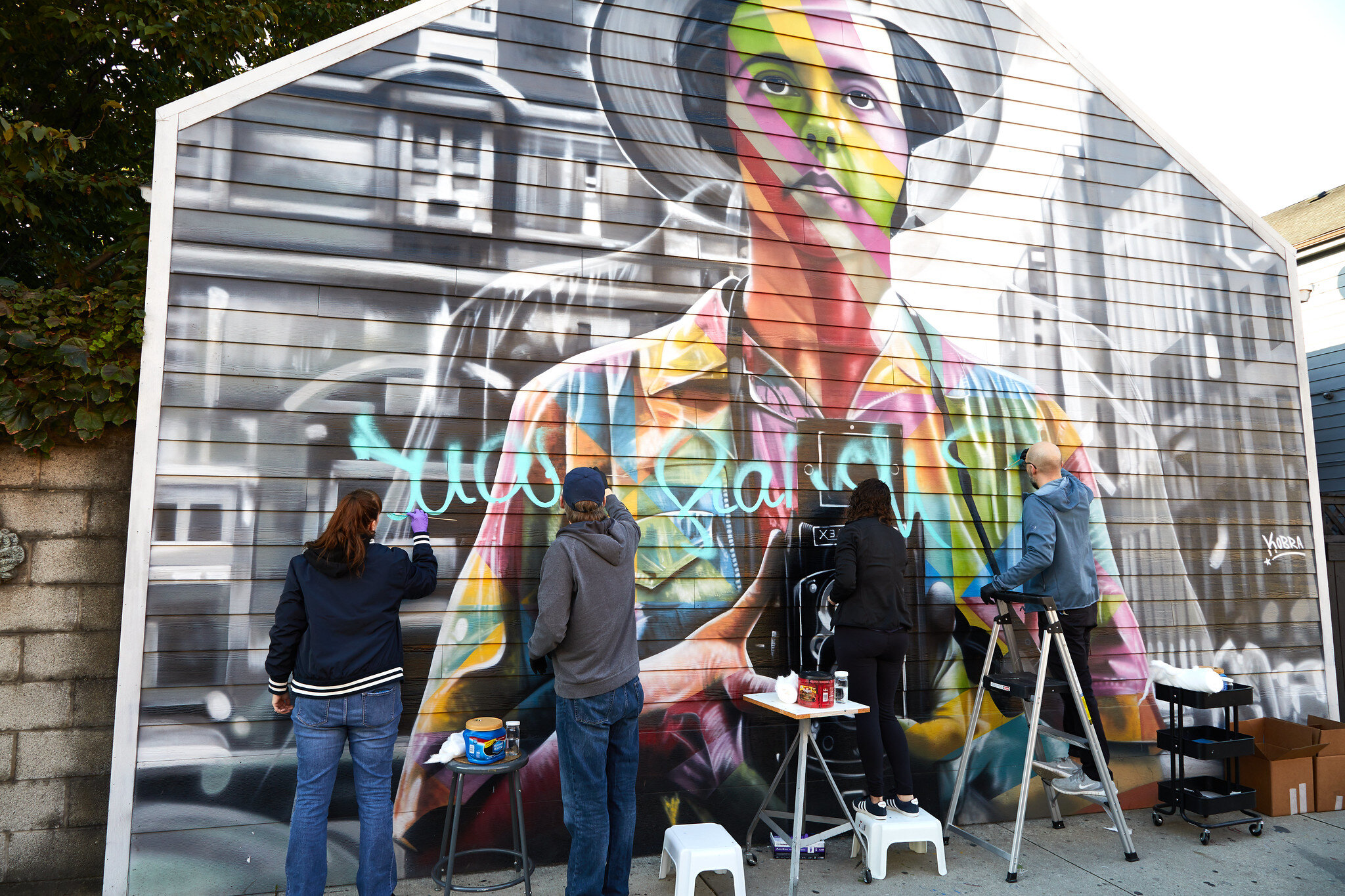 Our conservators work to treat the mural.