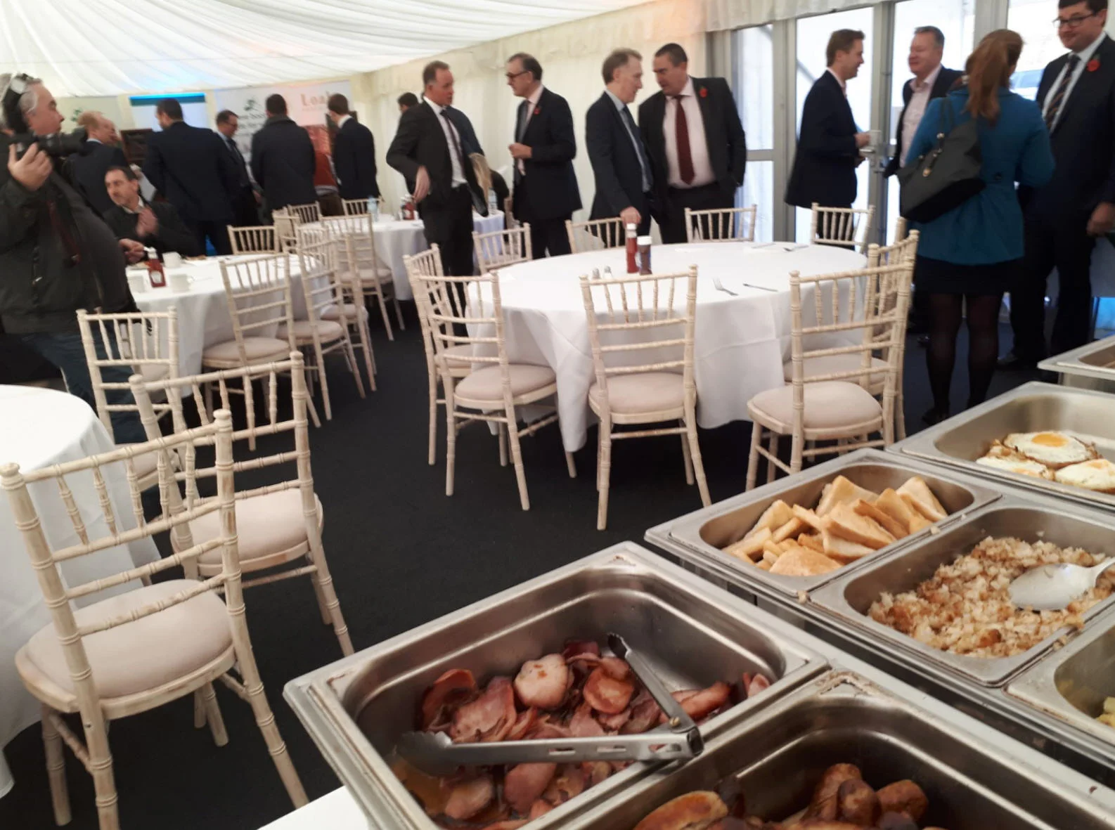 Customers and Employees assemble ready for breakfast.