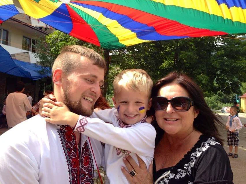 HUHTC - Project Pic - Lasha, Serhiy, and Kid (Lasha).jpg