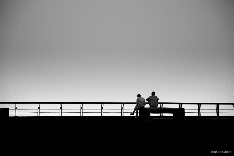 BEHIND THE RAILING