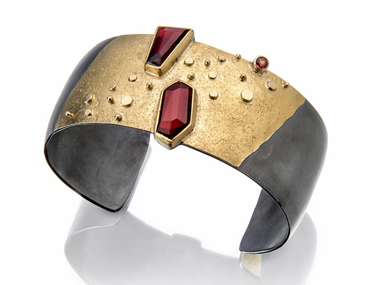 Sydney Lynch Sydney is a nationally known jewelry maker who lives here in Lincoln. Her jewelry combines high-karat gold with oxidized silver, in a sculptural style that is both contemporary and timeless. Sydney's one of a kind pieces include a wide range of colored gemstones, while her simpler black and gold designs can be worn with jeans or evening wear. Website: http://sydneylynch.com /