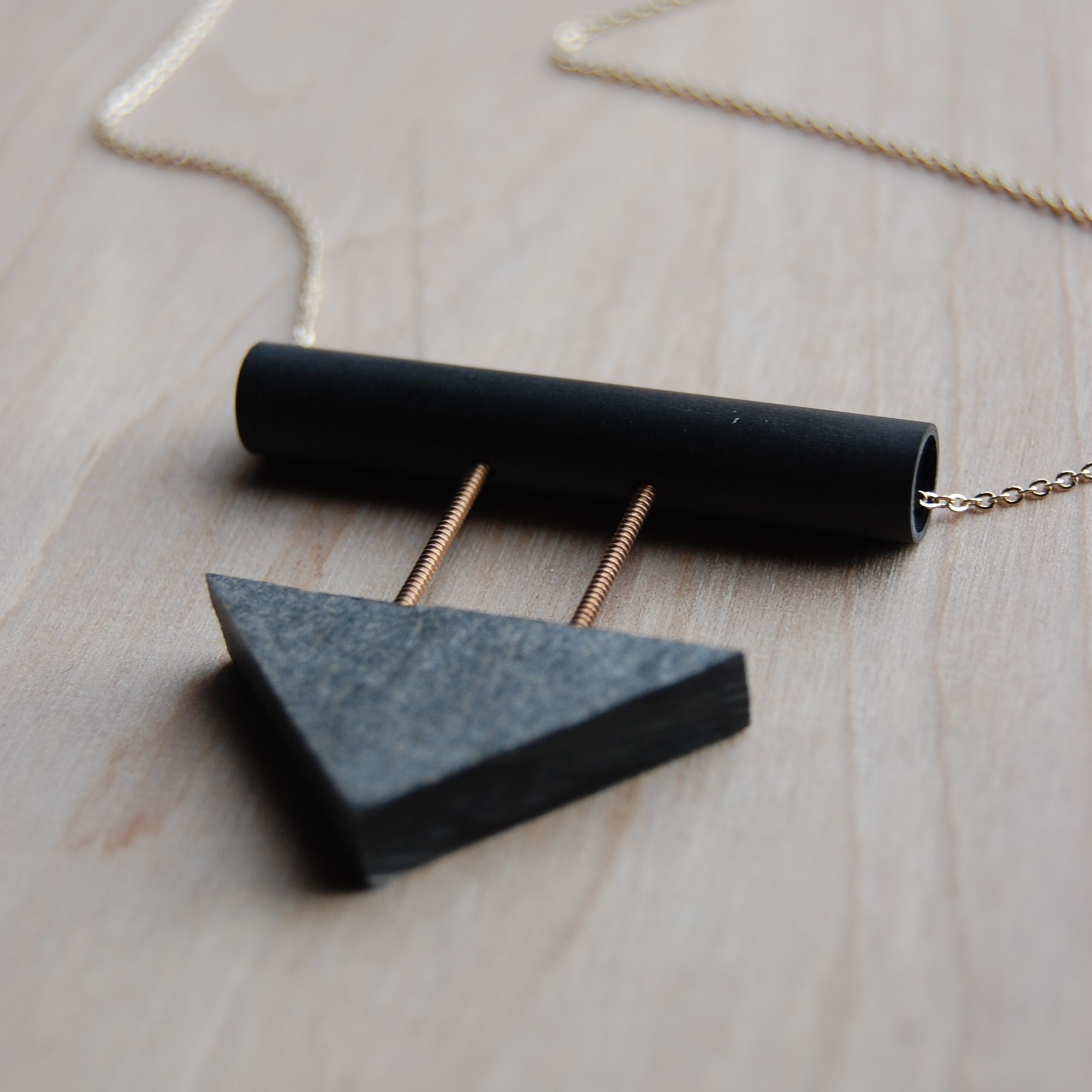 Jen Carlson Jen creates one of a kind jewelry often made from recycled materials. Her designs are bold, modern and graphic.