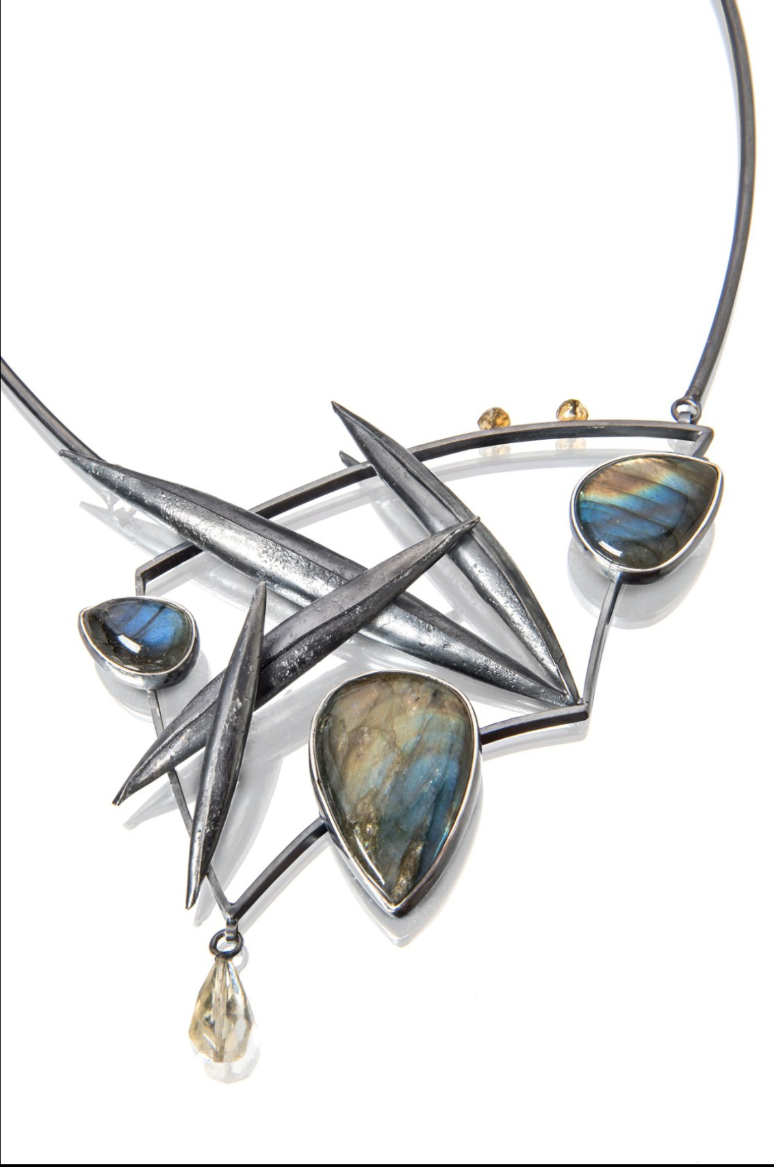 Tammy Rice "I make art jewelry pieces using predominantly sterling silver, copper, and some natural stones. It’s magical to see the pieces start from a simple idea in my mind and transform into tangible objects. I find inspiration in emotions, daily life experiences, and interactions with people. Each piece is a direct reflection of my inner thoughts. So viewing my work is much like a visual diary with a vocabulary all my own." Visit Tammy's website to see her current and past collections. http://www.tammybjewelry.com/