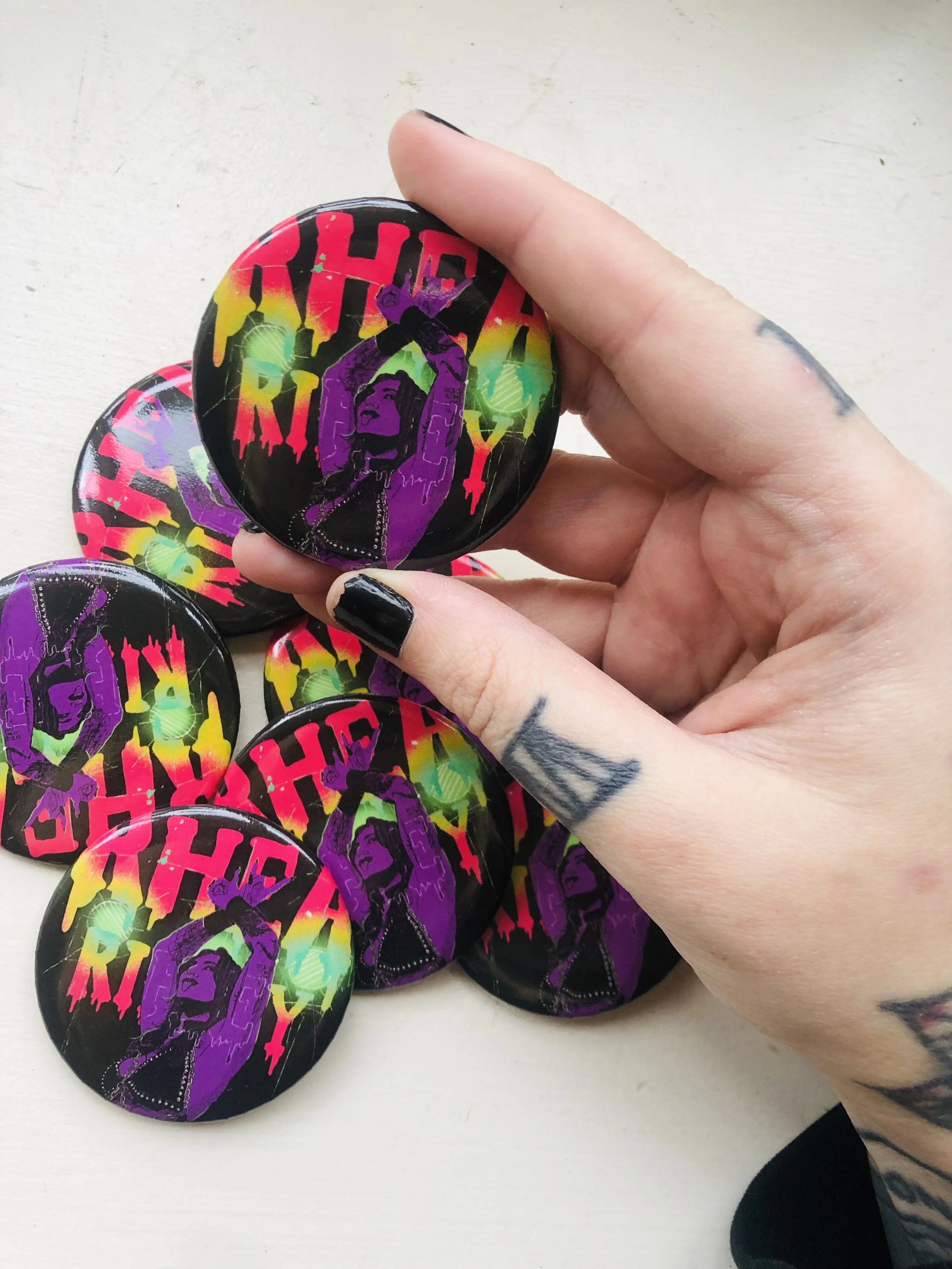 rhea button 2.jpg