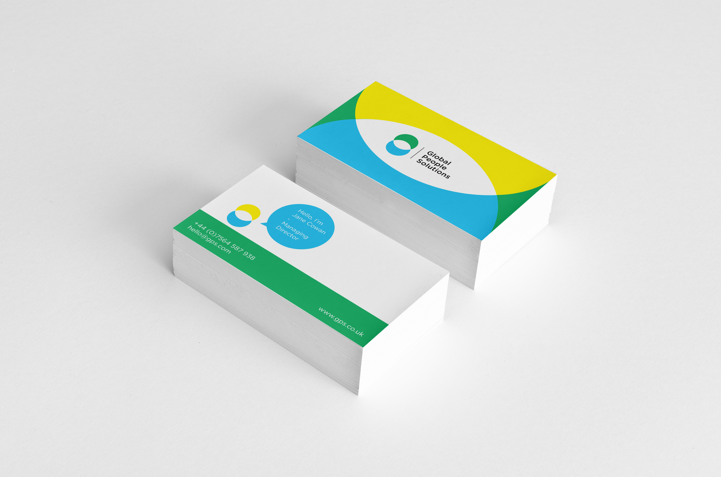 Brand consultant UK Two stack of Global People Solutions business cards in platinum background