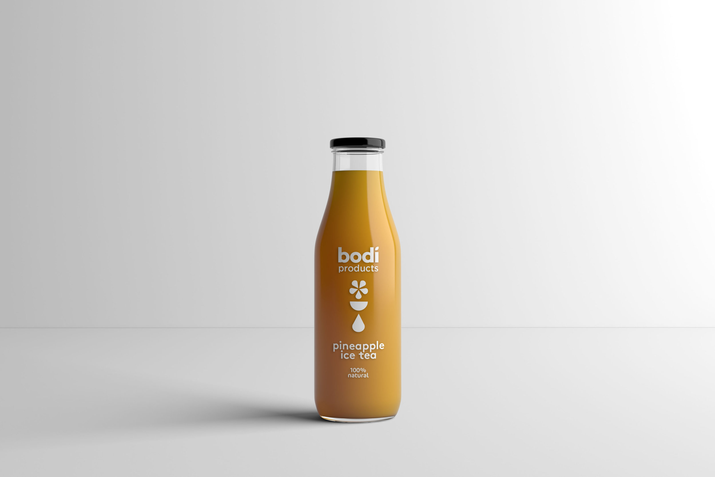 Packaging Designers UK Bodi pineapple ice tea in transparent yellow glass bottle