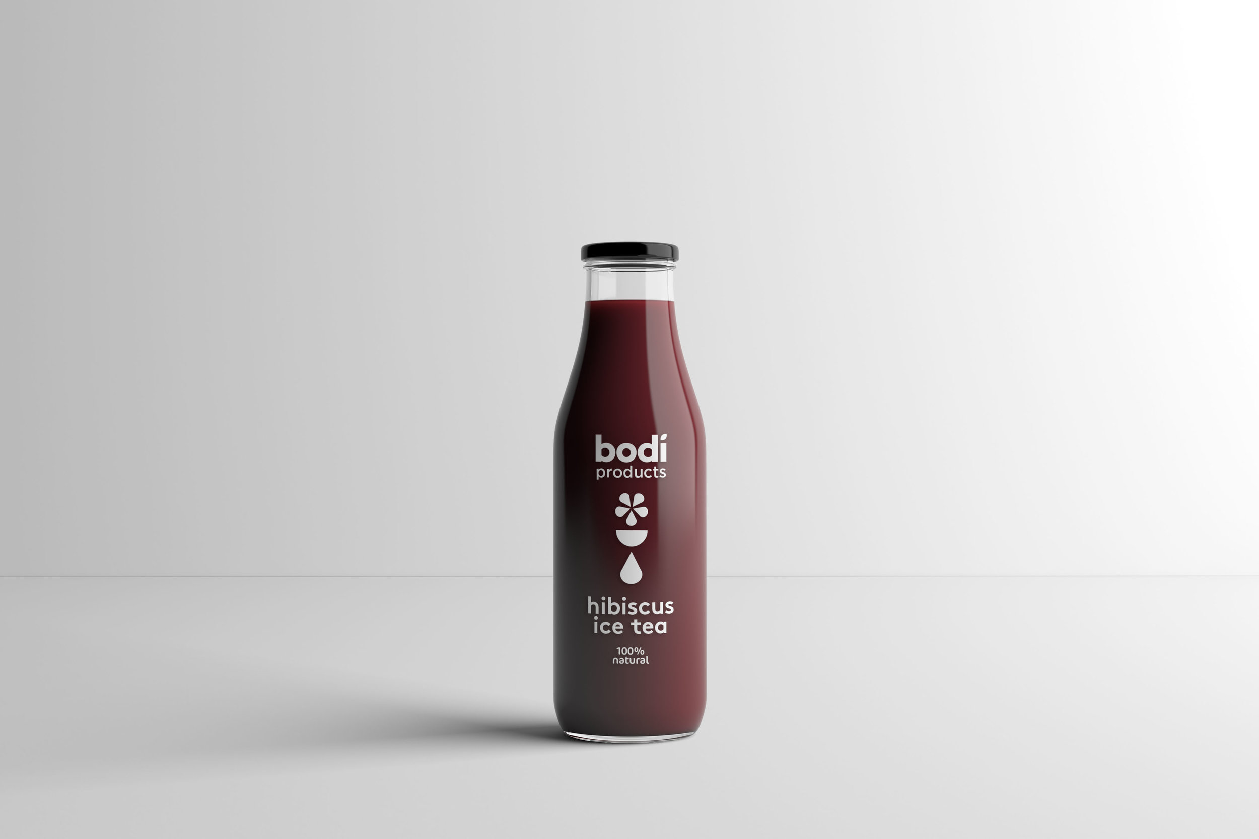 Packaging Designers UK Bodi hibiscus ice tea in transparent burgundy glass bottle