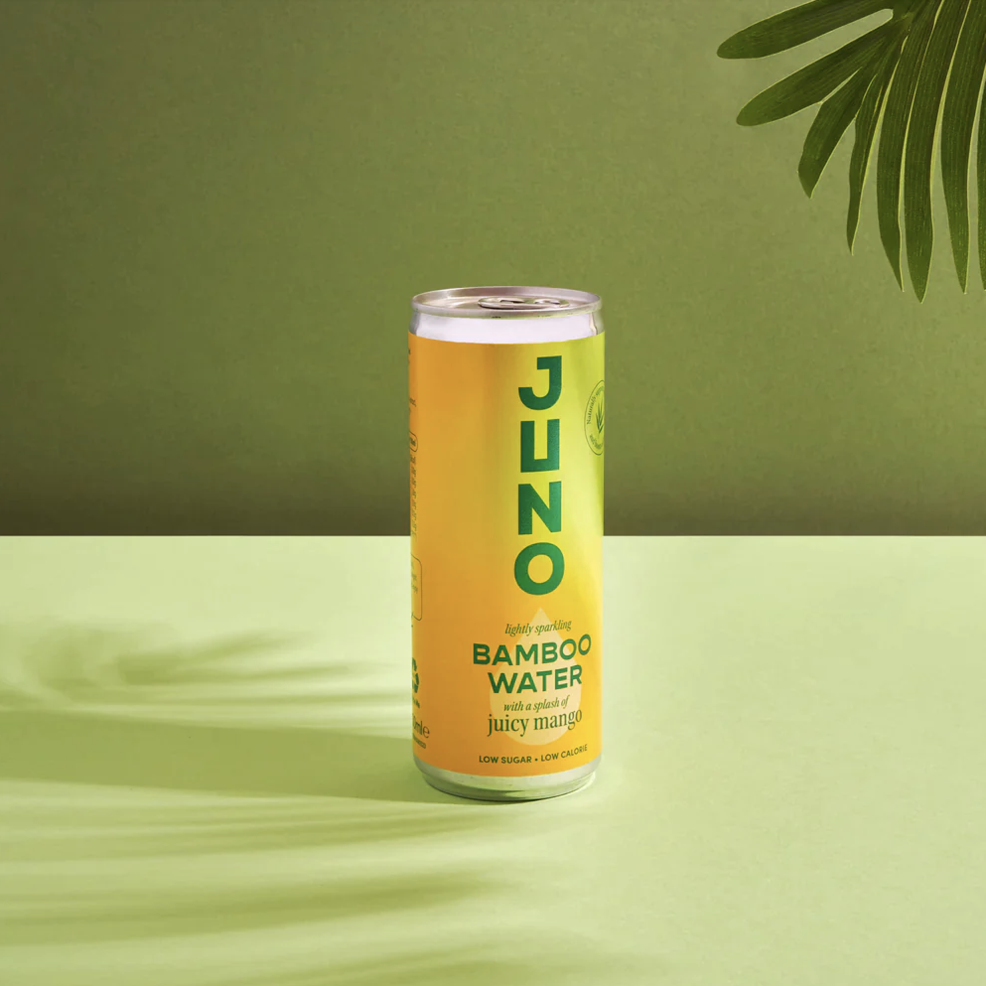 A yellow can of Juno bamboo water