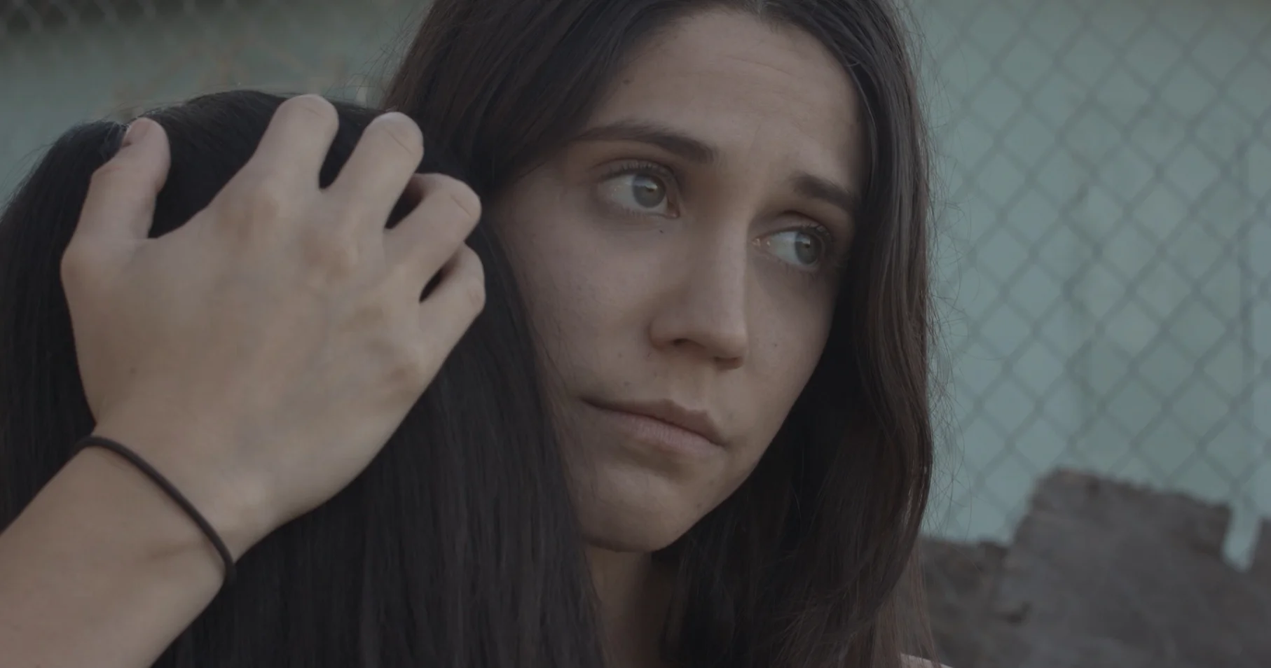 Xiomara comforting Maria.jpg