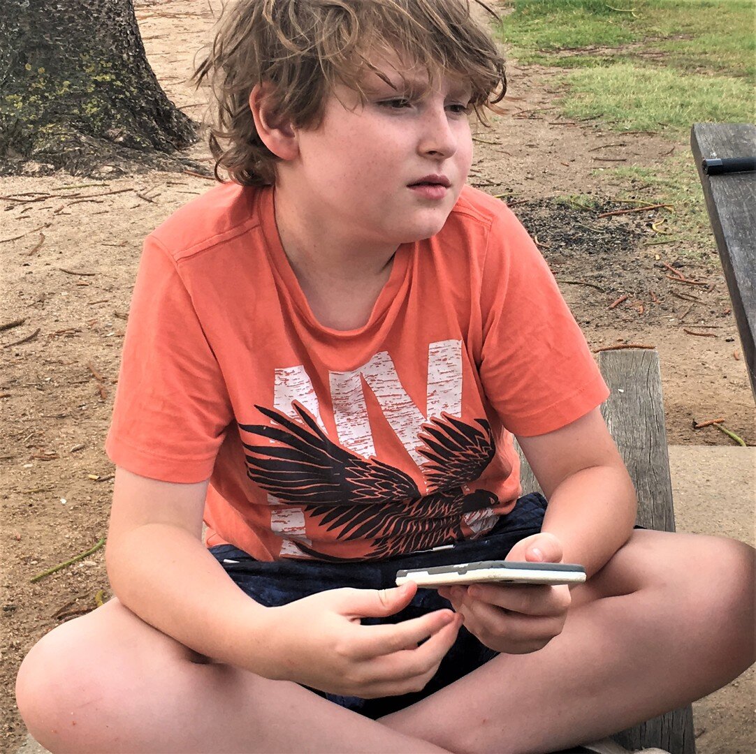 Photo 5 Caleb_thoughtful.jpg