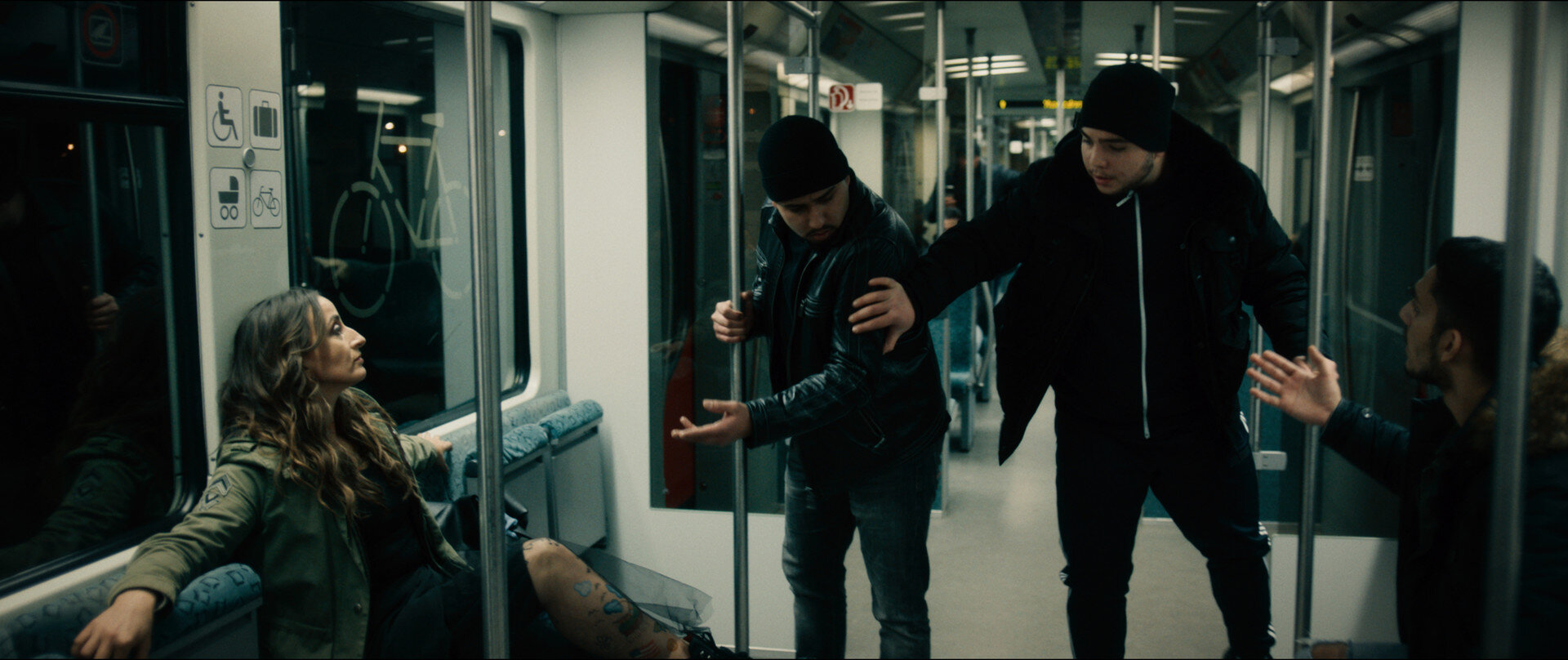 Photo 1 Boys_in_Metro_looking_at_tattoo.jpg
