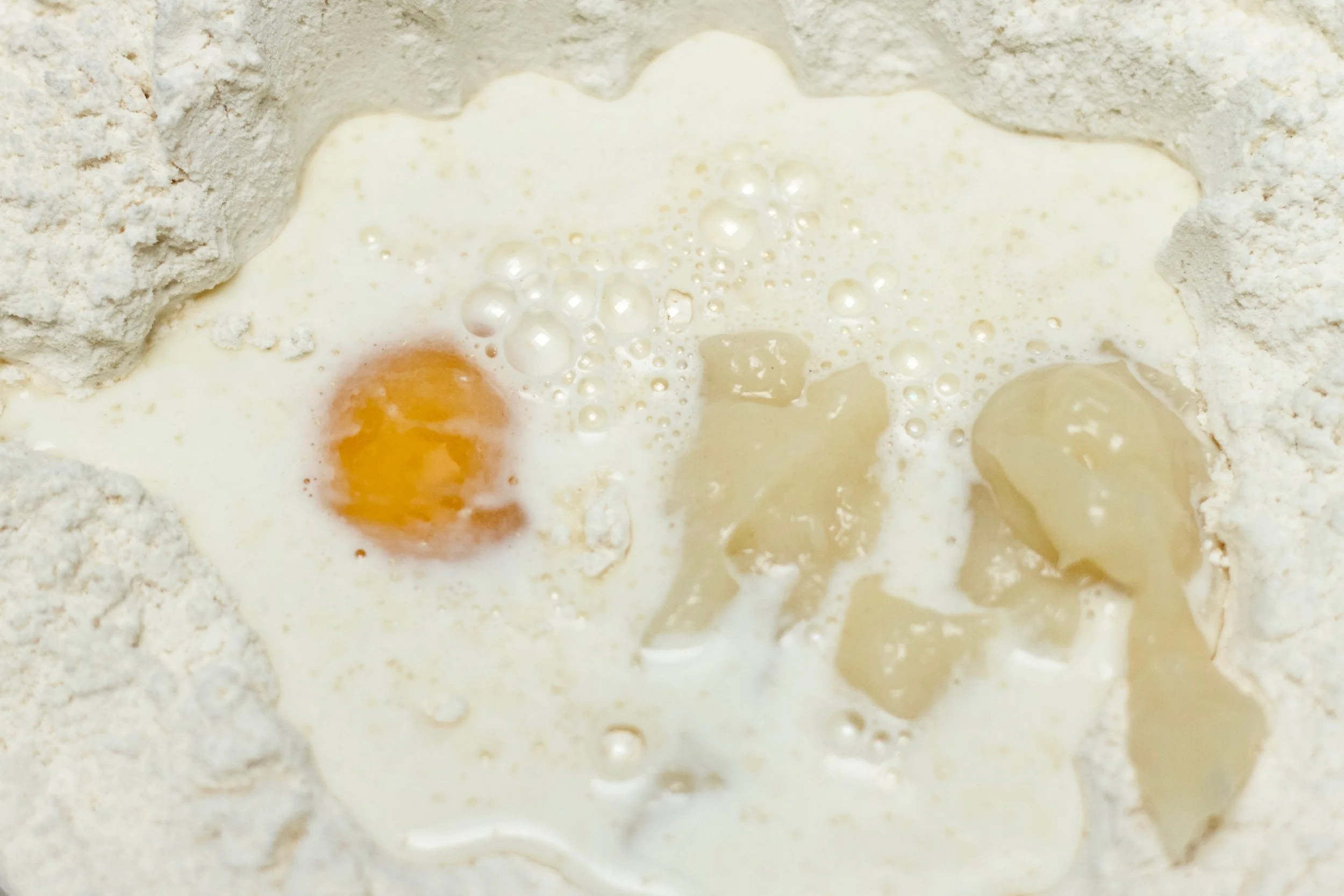 Adding the wet ingredients into the dry ingredients