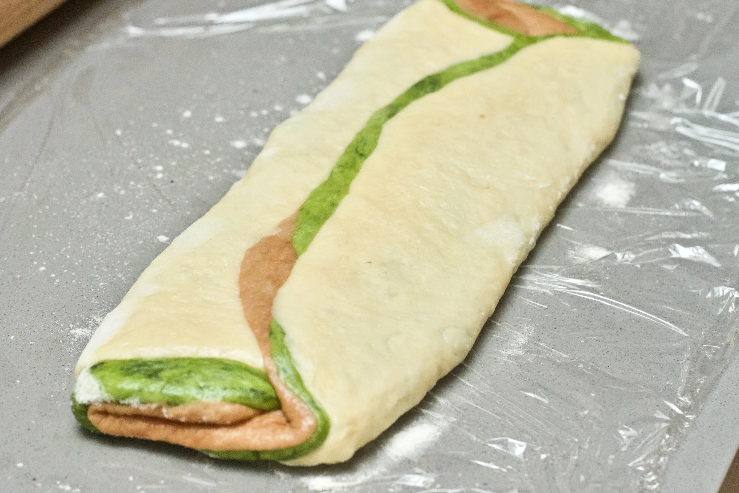 Run the rolling pin a few times on top of the rolled dough so it sticks together
