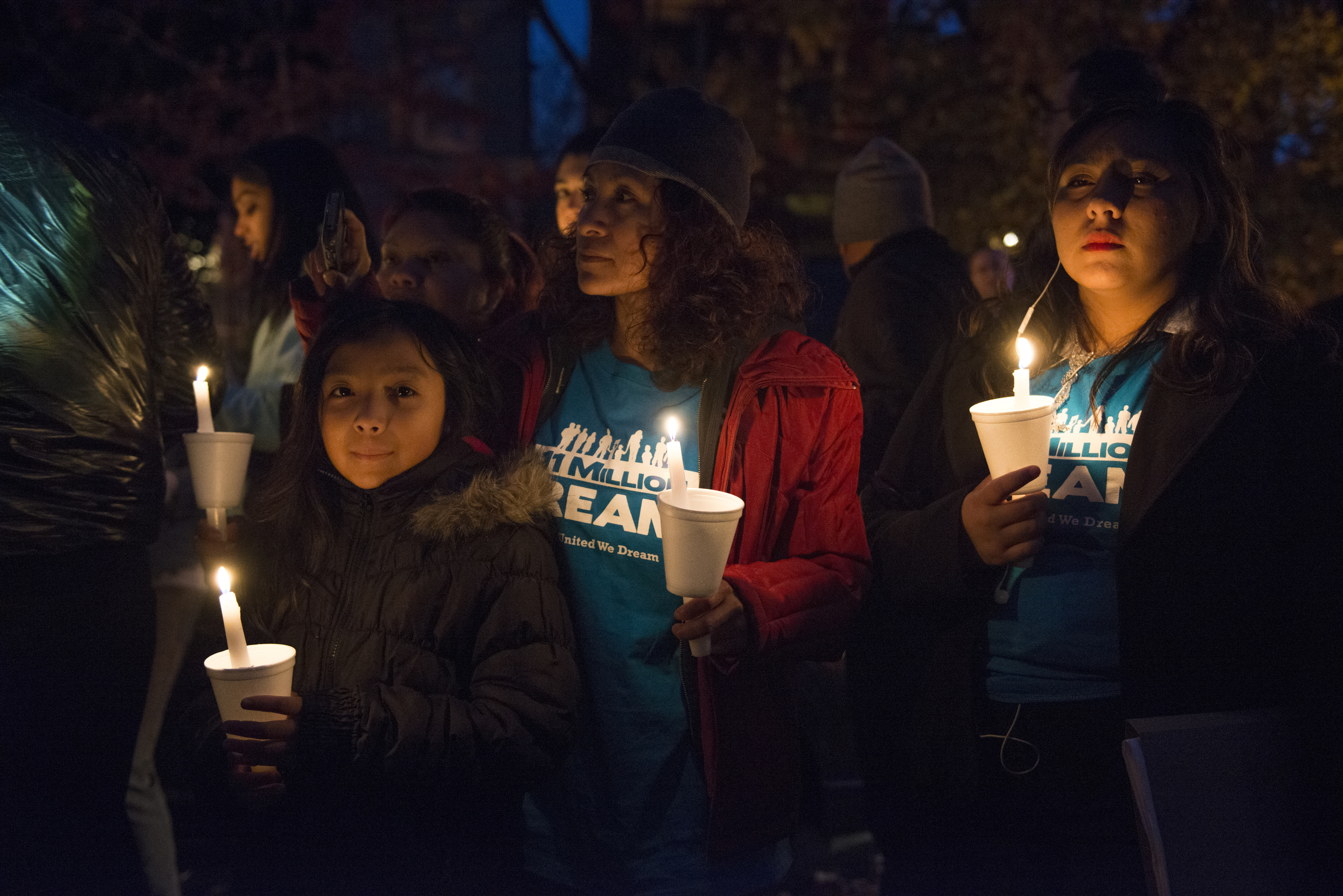   Evelia Gonzalez and daughter Sara participate in a candle light vigil outside of Speaker of House John Boehner's residence in Washington, DC., on November 20th. Members of the group Dreamers, mostly of hispanic students hold a candle light vigil ou