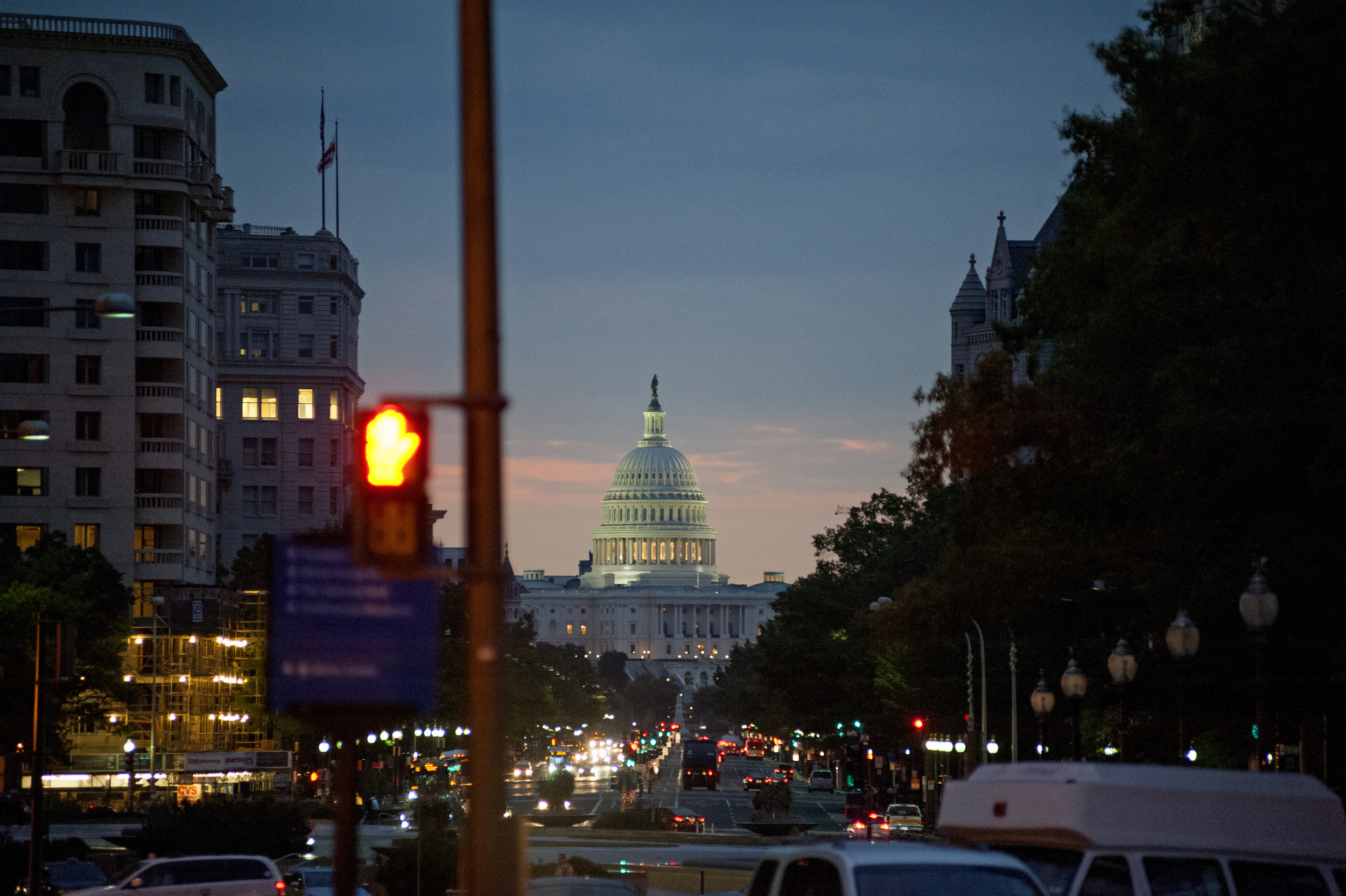  The sun rises behind the Capitol on October 1st during the Government Shutdown.  (Photo by Marlon Correa/The Washington Post) 