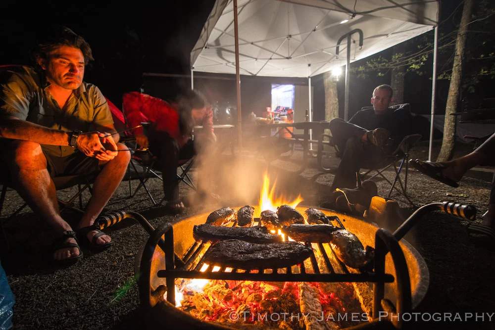 We won't look this legit but we'll be cooking over an open fire for days on end. Bring your favorite craft beer or spirit and let's have a good time. Photo: Timothy James Photography