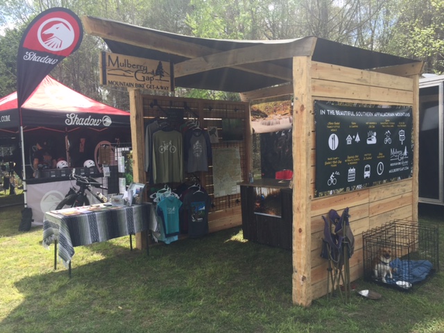 Our booth and little Nugget on the side swooning the people. We may or may not have had a sign on his crate that said "I need a home... Adopt Me." 