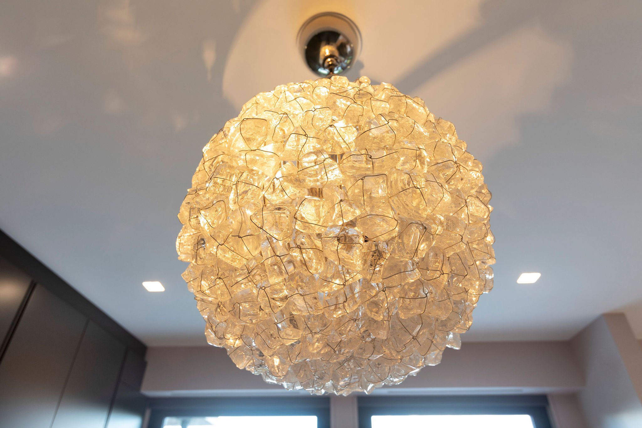  The centerpiece of the closet is this gorgeous rock crystal chandelier which will light up the space in the evenings. 