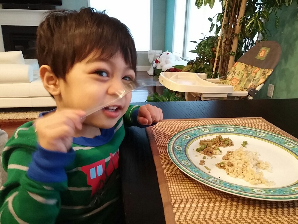 Constantine eating picadillo