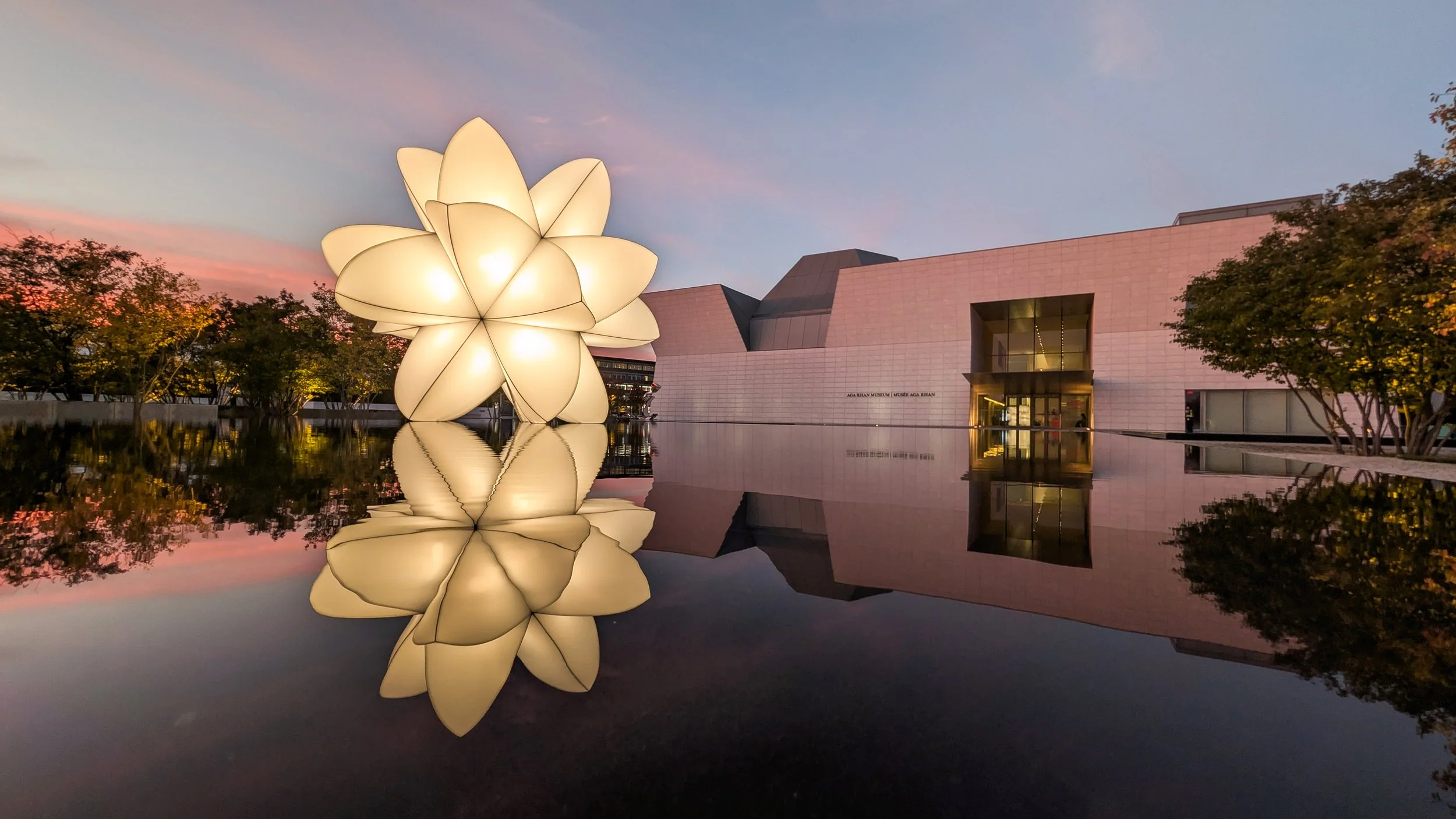 JAH Qube, materia prima, 2026. Aluminum, rip-stop nylon, light. Centre Pool,  Aga Khan Park, Toronto. Photo: Raheel Azim