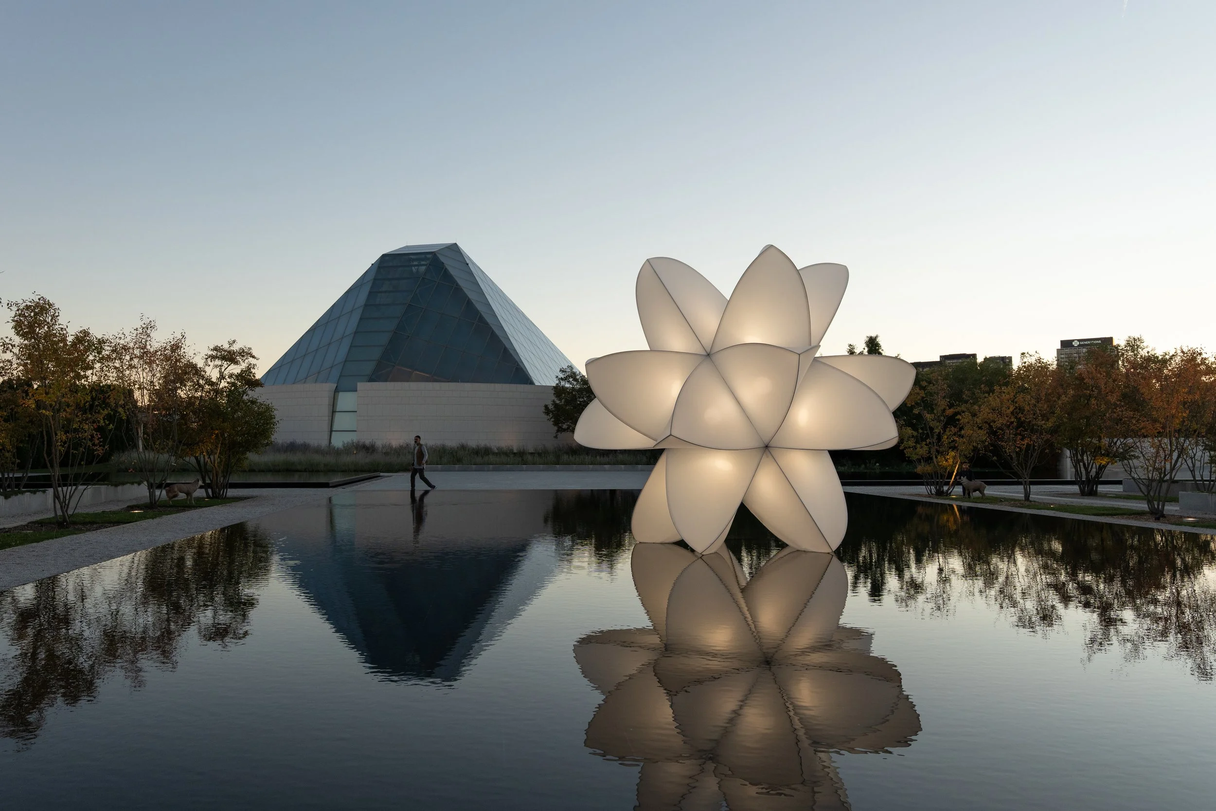 "materia prima" by JAH Qube is an illuminated tent fabric crystal floating upon the central pool of the Aga Khan Park.