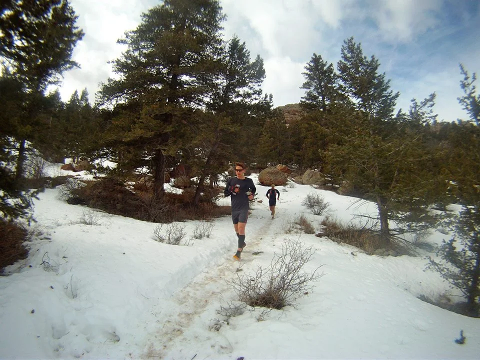 16 miles in, a few runners reach the summit of the Headless Horsetooth 50k, and the half-way point.