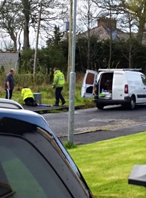 Irish Water working in Ard Ban, Muff, Co Donegal with a logo on their van and without safety barriers.