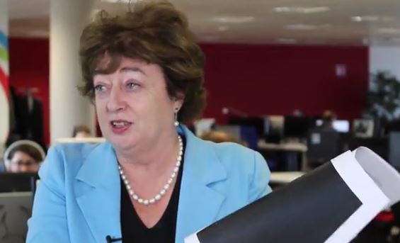 Catherine Murphy TD holding heavily redacted (blacked out) pages from Siteserve transactions which were passed on to her by Dept of Finance after months of requests.