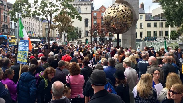 The protesters marched from the Central Bank around College Green and up to the Courts of Criminal Justice