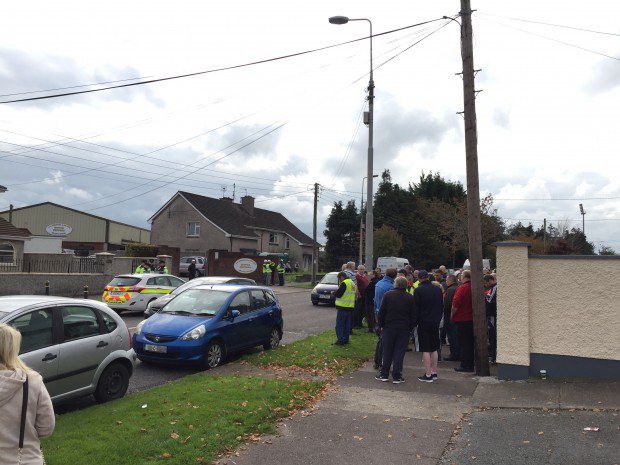Gardaí look on as anti water meter protesters prevent the installation of meters on Pearse Road, Ballyphehane this week.