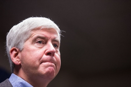 Michigan Governor Rick Snyder speaks to the media regarding the status of the Flint water crisis on January 27, 2016 at Flint City Hall in Flint, Michigan