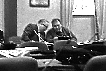 (l to r) Let’s decide on a plan of action. Councillors Frank McBrearty and Michael McBride confer discreetly at Monday morning’s meeting of Donegal County council.