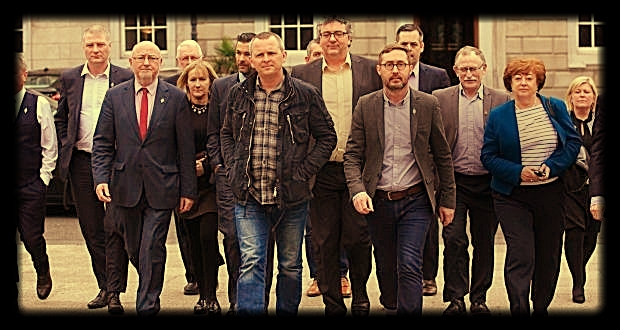 A group of R2W TDs predominately Sinn Féin, heading to the Dáil plinth on April 6th. At front Richard Boyd Barret, PBP, left and Eoin O Broin, SF, right