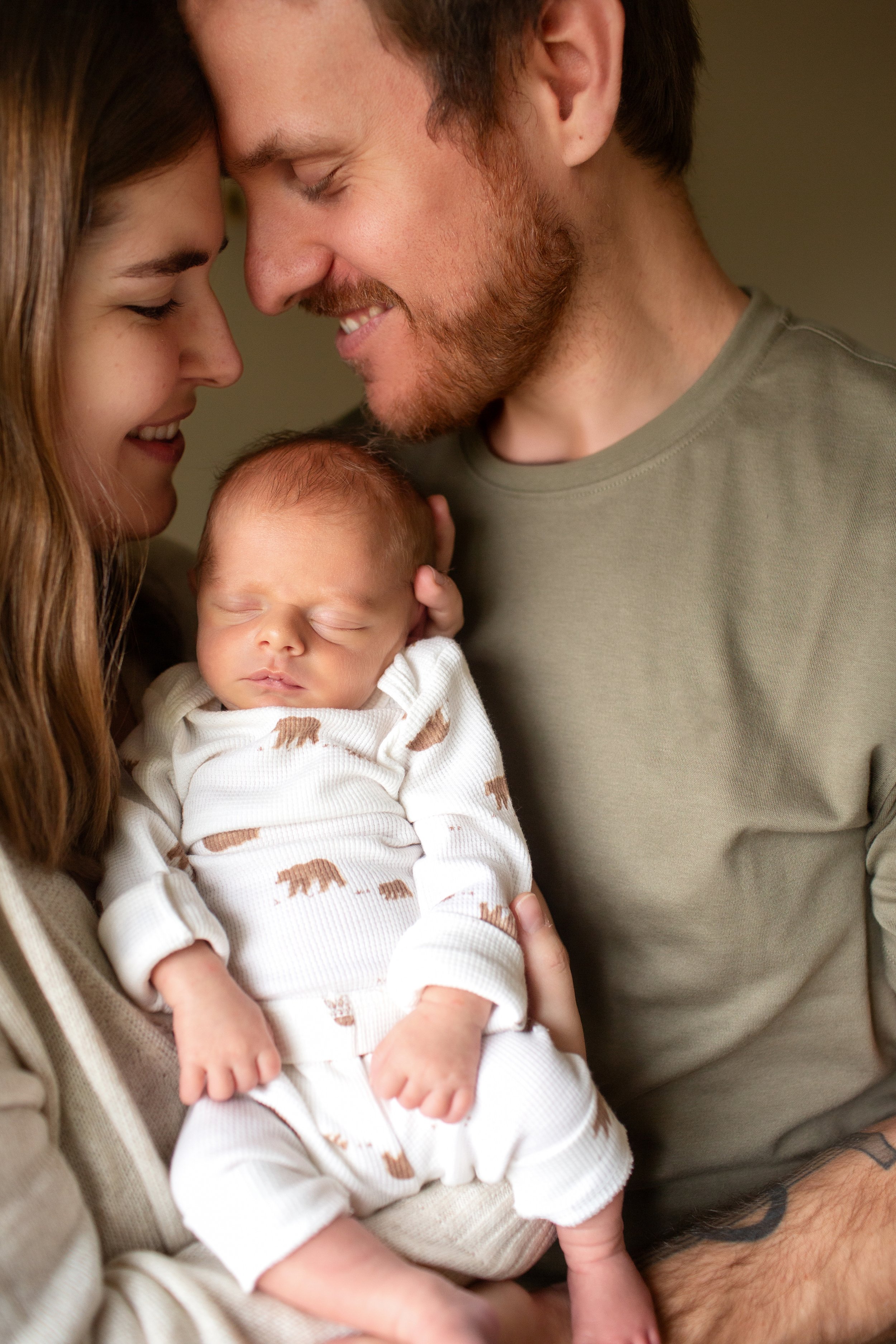 Denver Newborn Lifestyle photos in home with infant and parents