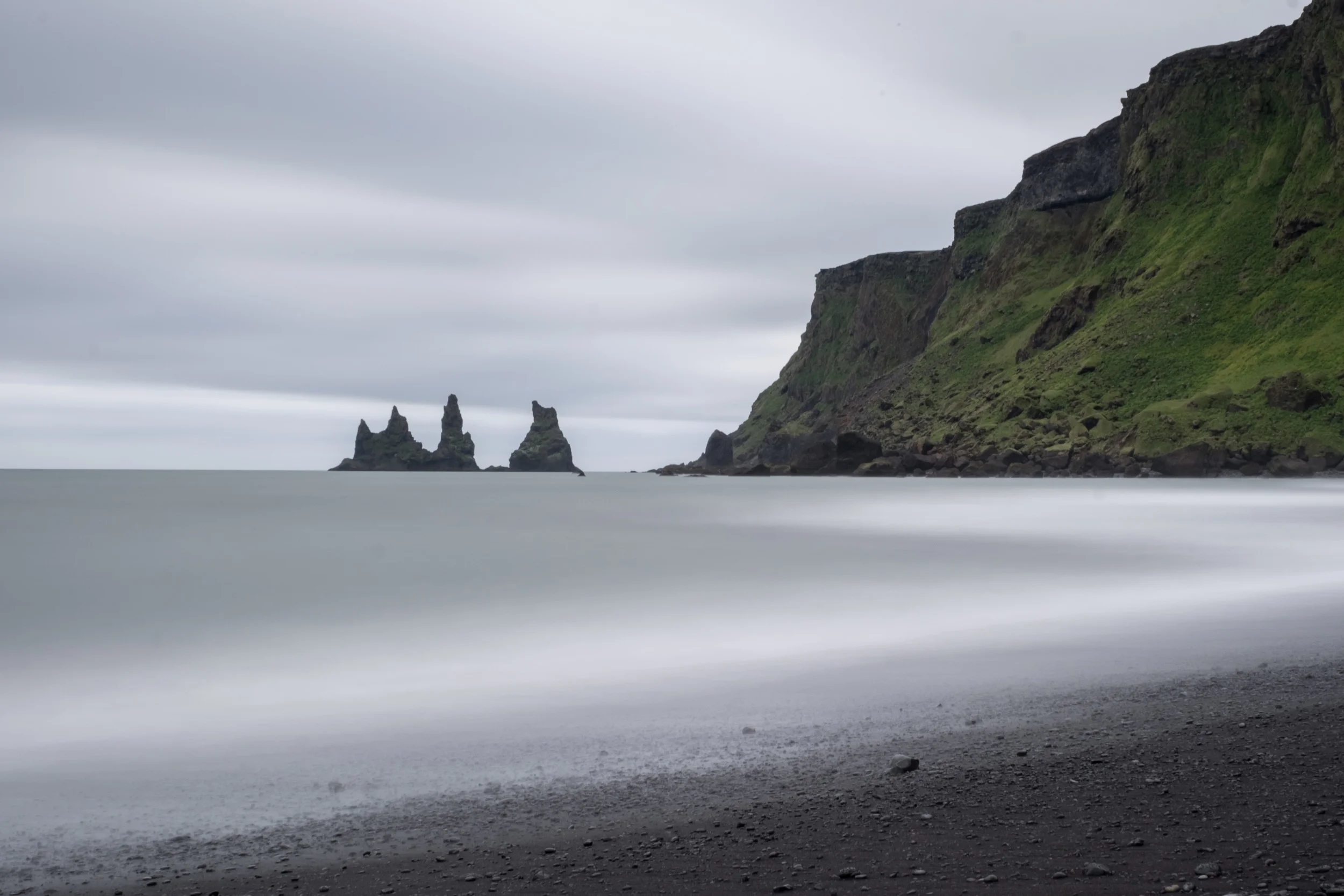 Vik Beach long exposure. Look at that black sand and those sea stacks!