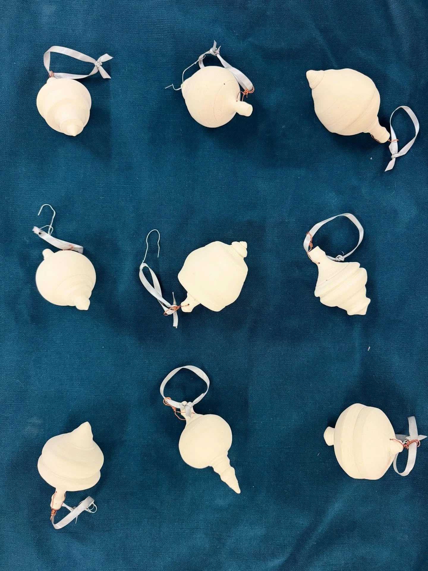 Merry, Merry! I keep forgetting to share that I have ornaments😊🎄 Wheel-thrown porcelain(hollow) forms. Each one is original with multiple spins on the wheel between throwing orbs, trimming and little spindles and knobs. Copper wire is threaded thro