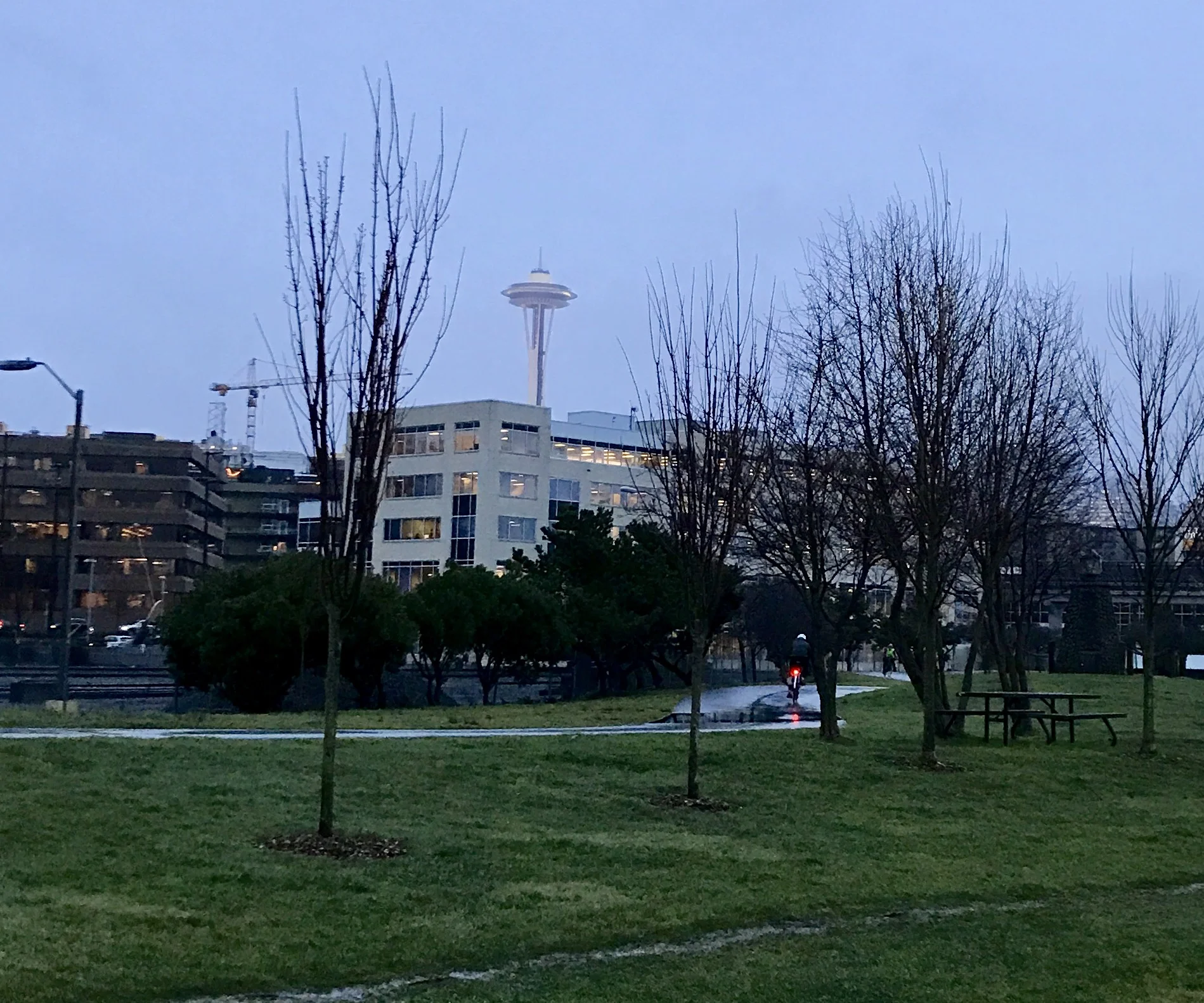 Space Needle running on the Alaska Way footpath - Seattle