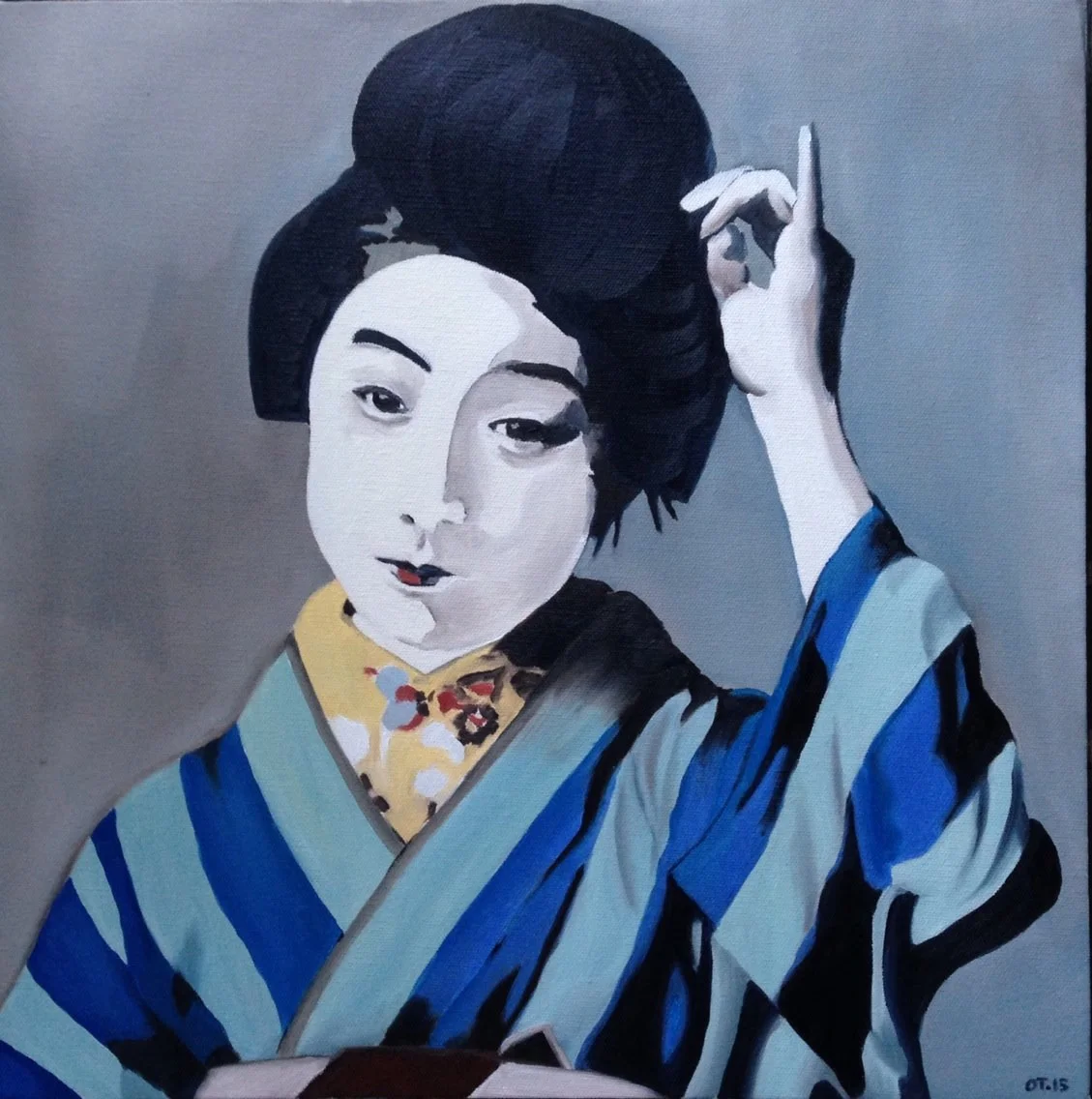 Woman in grey & blue